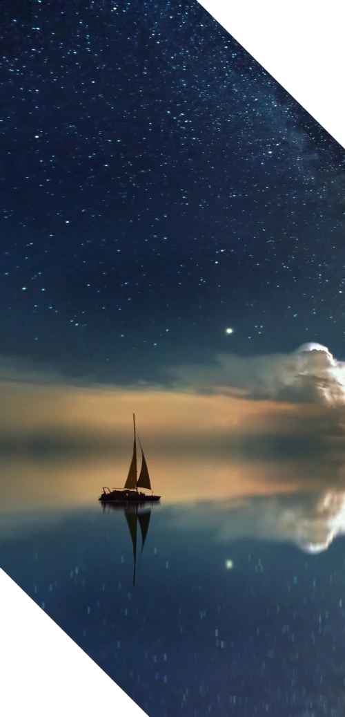 A galley exploring the ocean on a stary night